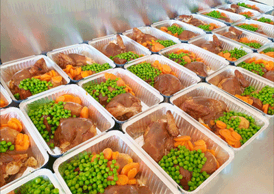 Roast meals and vegetables pictured on the original Golden Chicken catering page